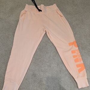 Pink Joggers with Orange Logo